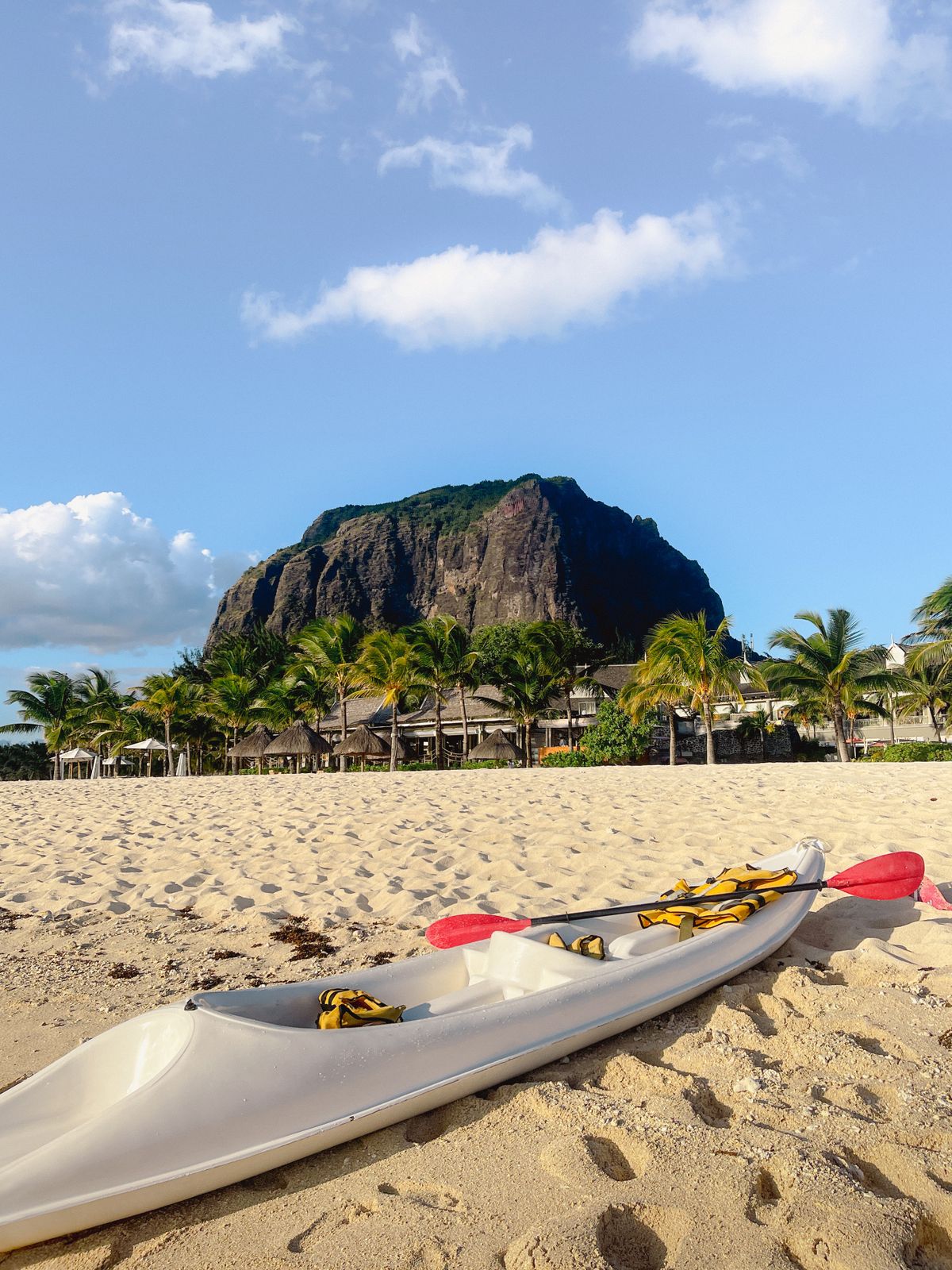 Kayaks on the beach beneath Le Morne Brabant in Mauritius