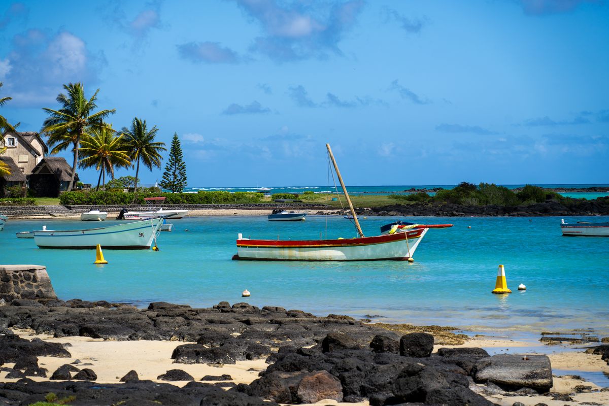 Colourful boats in a turquoise Mauritius lagoon
